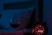 How Alcohol Affects Your Sleep (And What To Do About It) Late night drink and the alarm clock