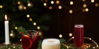 Holiday Cocktails for 2025 You’ll Want to Make Every Year Festive Holiday Table Setting with Delicious Cocktails and Decorations